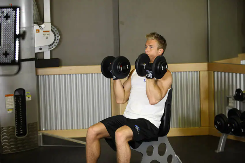 Arnold Dumbbell Press — posisi awal