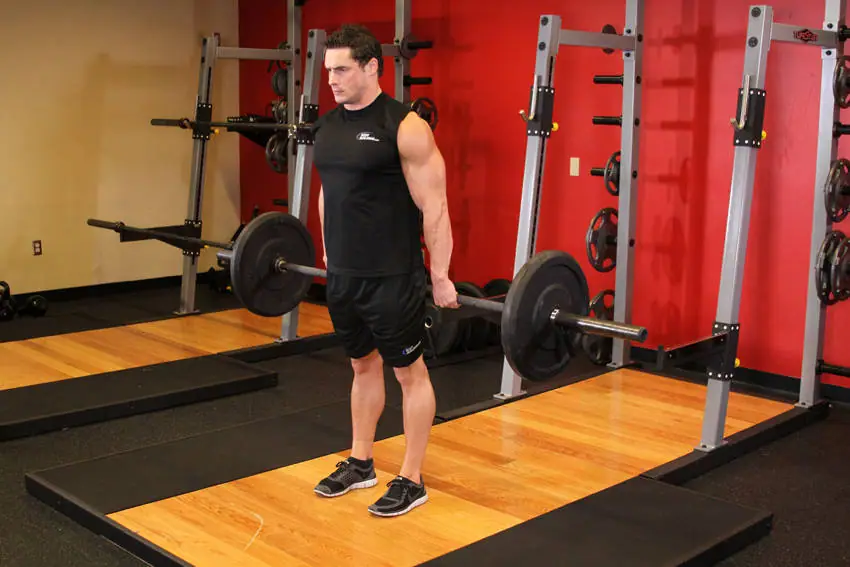 Barbell Hack Squat — posisi akhir