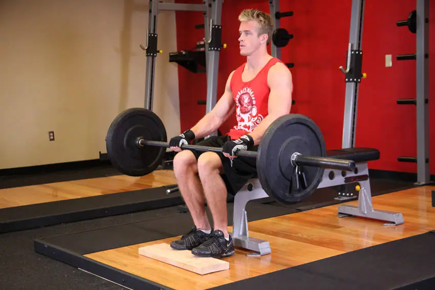 Barbell Seated Calf Raise — posisi awal