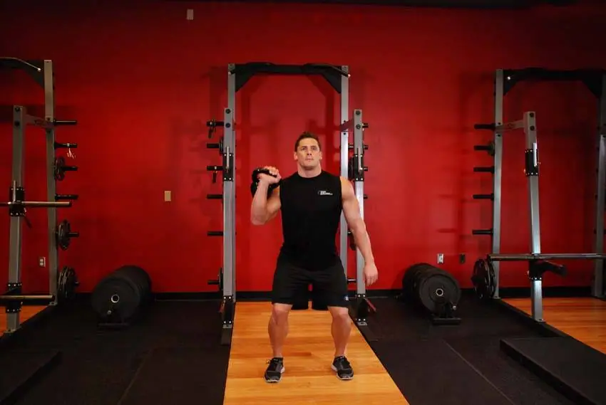 One-Arm Kettlebell Jerk — posisi akhir