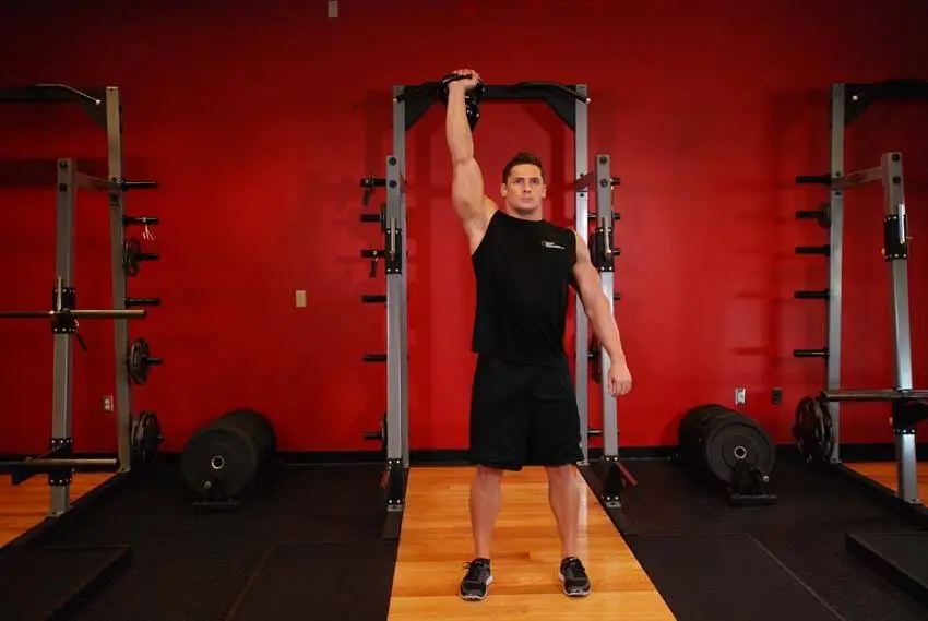 One-Arm Kettlebell Para Press — posisi akhir