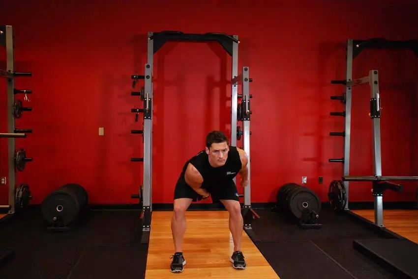 One-Arm Kettlebell Snatch — posisi akhir