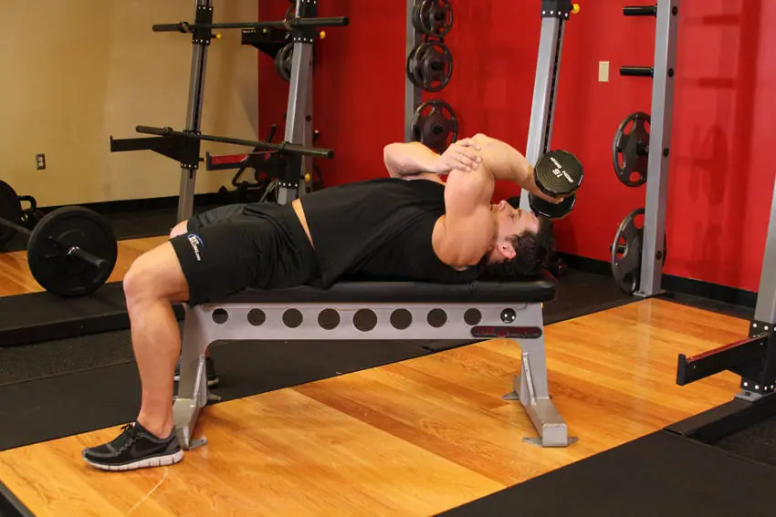 One Arm Pronated Dumbbell Triceps Extension — posisi akhir