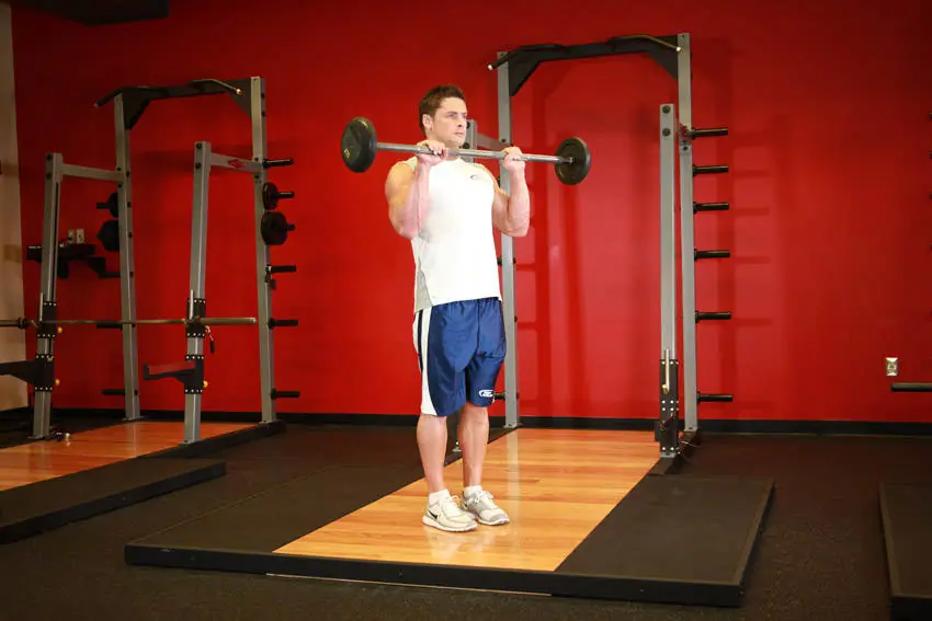 Reverse Barbell Curl — posisi akhir