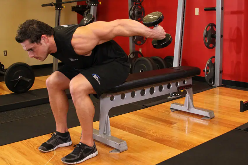 Seated Bent-Over Two-Arm Dumbbell Triceps Extension — posisi akhir