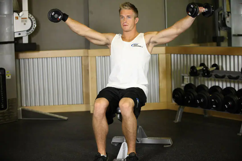 Seated Side Lateral Raise — posisi akhir