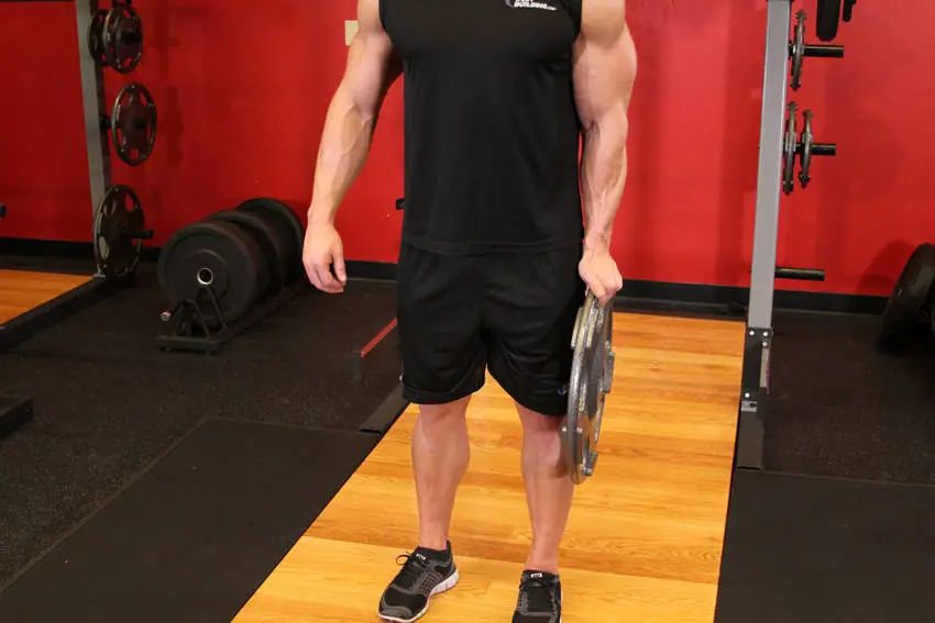 Standing Olympic Plate Hand Squeeze — posisi akhir
