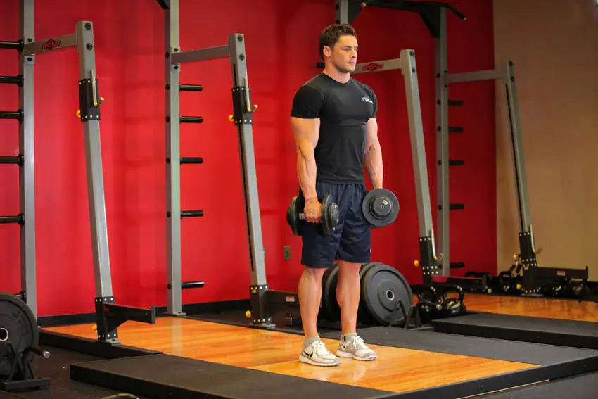 Stiff-Legged Dumbbell Deadlift — posisi awal